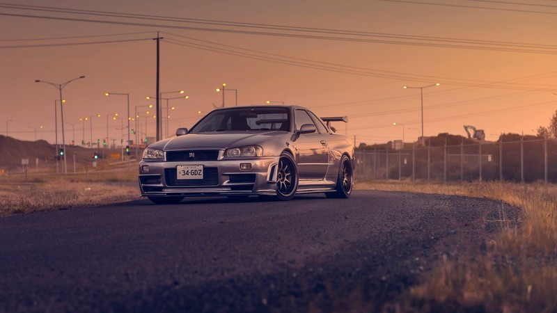 街头日落下的JDM战神！这组日产Skyline GT-R R34壁纸太绝了